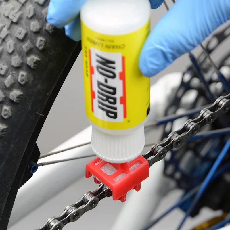 Aplicador de lubricante para cadenas de motocicletas y bicicletas